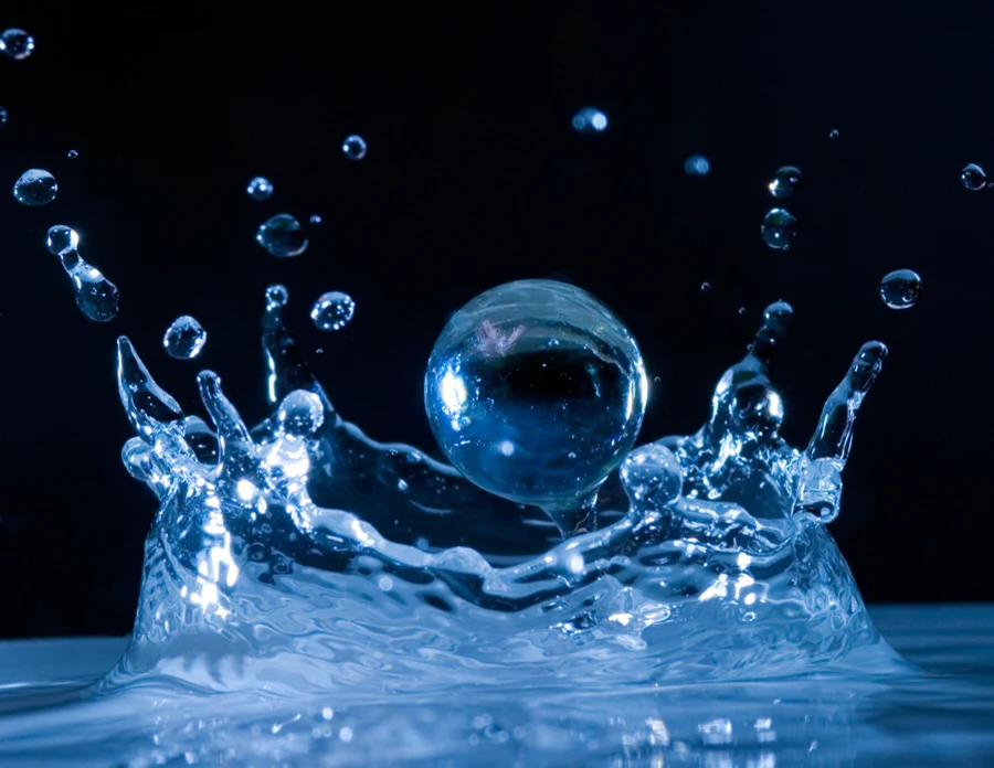 A water drop hitting a liquid surface
